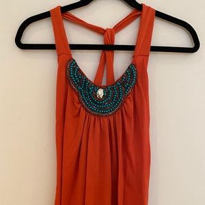 Orange and teal tank